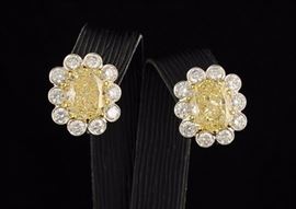 Appraised Retail Value: $ 220,000.   Asking: $120,000.  18K yellow and white gold fancy yellow radiant diamonds earrings - 4.61cts and 4.53cts set with 2.76 cts round brilliant diamonds.  GIA report# 15242764  4.61ct    Natural Fancy Yellow GIA report# 15242766  4.53ct    Natural Fancy Yellow  -    THIS ITEM IS IN A BANK VAULT FOR INSURANCE REASONS.  IT WILL NOT BE ON-SITE.       Call 800-289-2850 for a private  appointment to view these items.