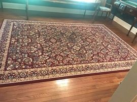 #55 Burgundy machine rug 92x132. $100