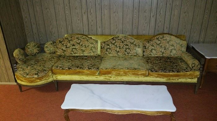 Vintage Couch - this would be a GREAT piece to reupholster! 