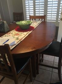 Ashley Pub Table and 6 Chairs w/ leaf