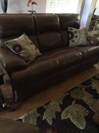 Electric Reclining Leather Sofa. 1 yr Old.