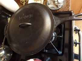 Giant old cast iron fry pan with cover