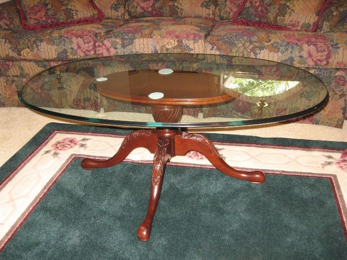Oval Glass Coffee Table and Beautiful Rugs...