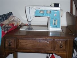 Singer Sewing Machine with Cabinet