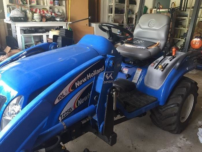 New Holland Boomer  TZ25DA Tractor with 10LA front loader plus 60" mower deck and Woods PHD25 post hole digger  - 213 hours                                          $11,500 may be purchased prior to sale at asking price