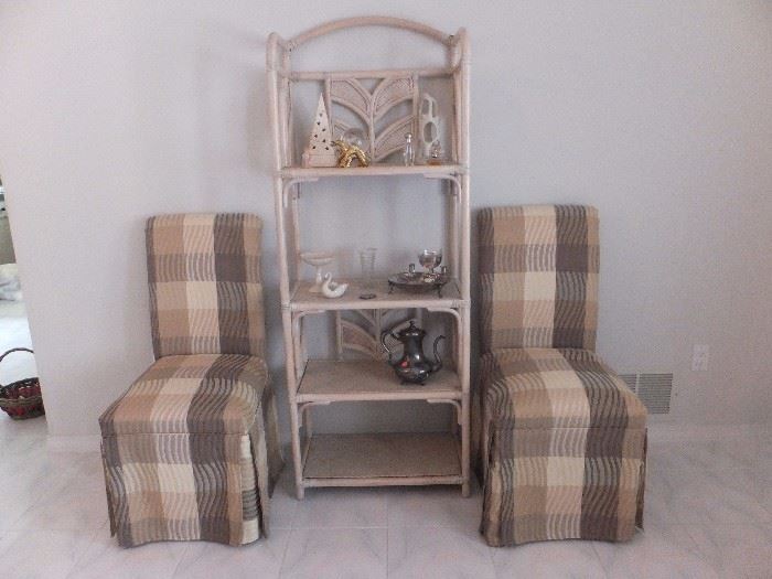 Dressed Parson's chairs and rattan etagere