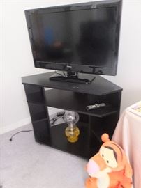 low corner media stand and Haier TV