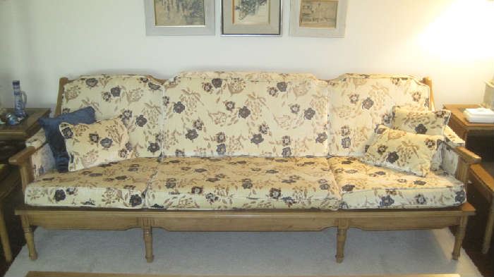 Mid-Century sofa with upholstered removable cushions in beige and navy tones- one of several pieces of the living room suite