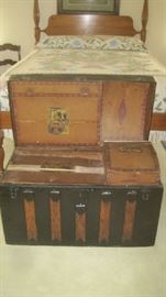 Inside antique trunk with various sections