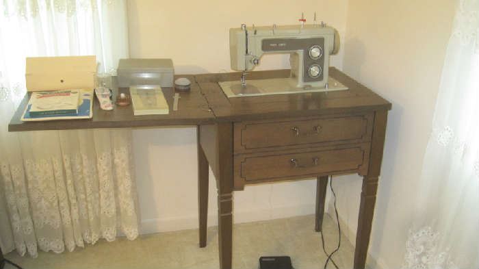 Kenmore sewing machine- model 158.15160 and sewing accessories