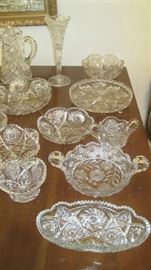 Numerous cut glass dishes