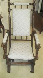 Upholstered rocking chair - part of a sitting area grouping