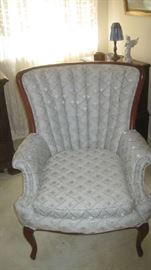 One of a pair of chairs that is part of the sitting set- with sofa and rocker
