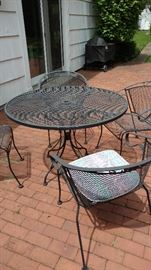 Lots of iron patio furniture.