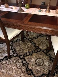 ROSEWOOD & MAHOGANY FORMAL DINING TABLE WITH BALL & CLAW FEET 
4-8 SEATING-ASKING $5,000
GREAT CONDITION
INCLUDES:
2 LEAVES
6 CHAIRS
(2 CAPTAIN CHAIRS WITH ARMRESTS & 4 REGULAR)
PURCHASED AT GORMAN’S
MSRP $9,870
