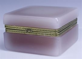 
Crafted of fine quality French opaline glass. Wonderful light pink to white body color. Gilt bronze hinge with a square design. Measures 2 3/4" x 4 1/4" x 4 1/4" Good condition with small flakes to front right corner. In house USA continental shipping $45 plus insurance