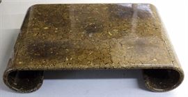 Features a oversized scale with scroll foot design. Finished with lacquered coconut shell veneer. Iconic example of design with impeccable construction. Unsigned, attributed to Karl Springer. Measures 48" x 72" x 16" Good condition with faded areas and surface scratches. Will not ship. Will refer a local shipper.