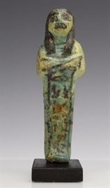 Crafted of faience pottery with green to turquoise glaze. Hand painted with heighroglyphs. New Kingdom circa 1200 B.C. Mounted to a wood plinth. Overall good condition with rubbing to surface and older restored break. Measures 4 5/8" x 1 1/2" In house USA continental shipping $45 plus insurance