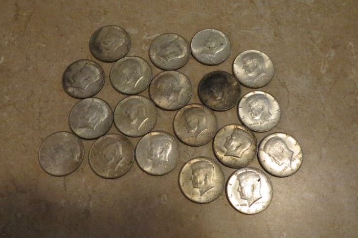 19 Kennedy silver half dollars.