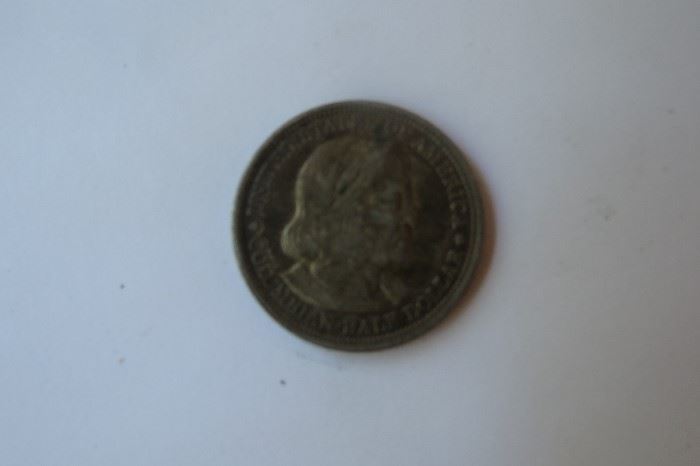 1892 Columbian Exposition half dollar commemorative coin.