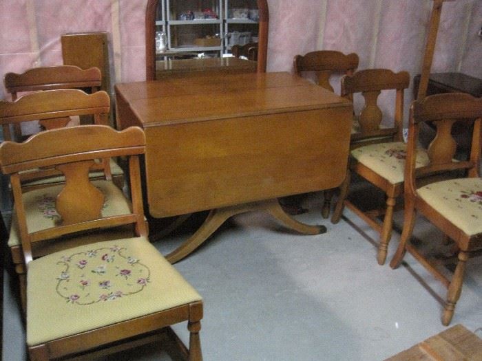 Drop Leaf Table with 6 Needle Point Chairs.