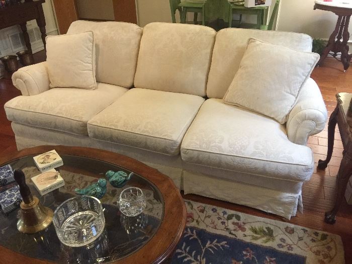 White brocade sofa in excellent condition
