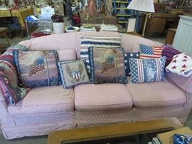 RED & WHITE SLIP COVER SOFA WIHT ASSORTMENT OF PILLOWS
