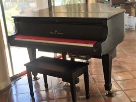 Young Chang Polished Ebony Grand Piano.  Pictures do not do this beautiful piano justice!  Gleaming ebony in perfect condition  Exceptional quality, finely crafted, and well maintained.  With added "player piano" feature. Absolutely Superb!  