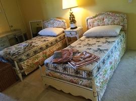 Two Matching French Provincial Twin Beds with Custom Headboard and matching dust ruffles.