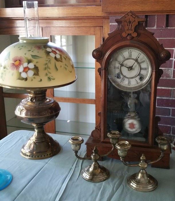 Oil lamp, antique clock, weighted sterling candle holders.