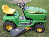 2000 John Deere LT155 38" mulch compatible mower with grass catcher, 15 hp OHV with touch auto trans, has new blades in package, runs good.