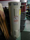 New Reliance 40-gallon electric water heater. Packaging and manual included.