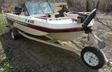 1979 Forester boat. 1978 Mercury 50 horse power motor. Interior redone with new seats, floor and carpet in 2012. Runs great. 2 batteries and 5 life jackets. 2013 license. 3 storage cabinets and rod holders. Steering wheel. Electric start. 2 gas tanks. Anchormate and 2 anchors. Trolling motor. Shorelander roller/bunk trailer with permanent stickers 2" ball. Canvas rain top. Boat cover.