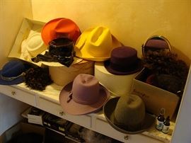 Large assortment of fashion hats
