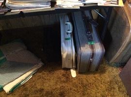 3 vintage suitcases