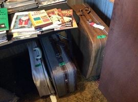 3 vintage suitcases