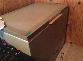 Nice chest freezer off carport in storage area - works great