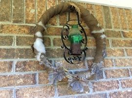 Wreath on walkway to house