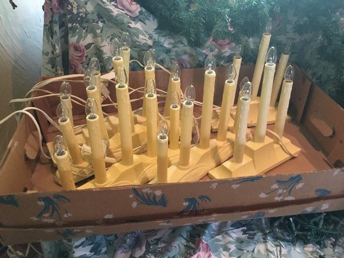 Several strings of light up candles