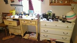 White chest, desk, office supplies, electronics, table lamps, and more