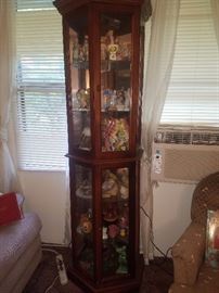 curio cabinet (lighted) with lots of collectibles