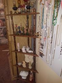 Corner shelf with miniature oil lamp collection and several other glassware collectibles including Lefton
