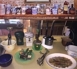 Steins and Salt Glaze Crock stoneware (bottom pic) Misc Jadite, custard glass and Green Handled kitchen tools, cobalt bowl, Juice O Matic Mid Century Juicer squeezer.