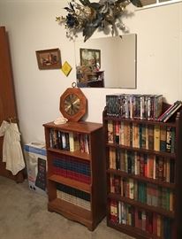 Shelving for books (as well as garage shelving available), MC Flamingo Mirror, DVD's, Clocks