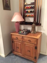 cabinet & large bell & rocks