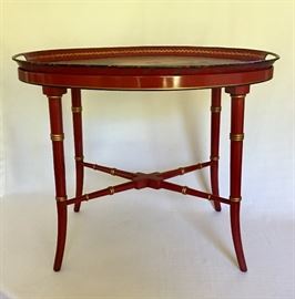 $250. Antique red tole tray, circa 18th century, depicts an English country scene and sits upon a modern custom made painted and gilt wood stand. Base is in excellent condition, while tray is very chipped. Dimensions 24.5ʺW × 17.5ʺD × 19.5ʺH. 