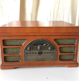$50. Crosley Record player with radio, CD & tape players.