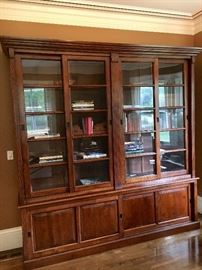 Giant glass front bookcases with bottom storage
