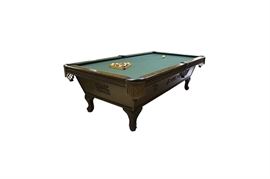 Antique Style Pool Table With Accessories: An antique style pool table with accessories. The wood table features ornate carvings, felt billiard fabric on the play surface, leather pockets, and rubber cushions. Accessories include a cue stick stand, nine cue sticks of varying sizes including one with carrying case, a claw stick, a ball rack, balls, a cover, and a basket of small items including chalk and instruction books.