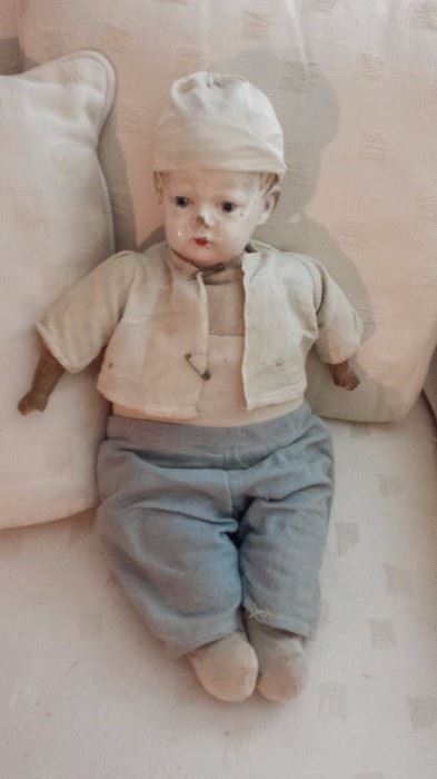 1911 Composition head boy doll, cloth body